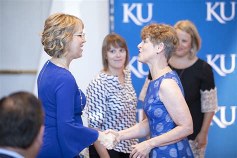 Chairperson and dean, graduate studies term: New KU athletic director enjoys moment with his family ...