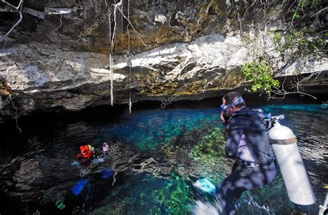 Scuba Divers In Cenote — Stock Photo © Stylepics 10151732