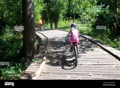 A family cycle through nature in rural france and explore the landscape