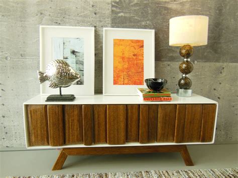 Organize the clutter with a polished sideboard or credenza that suits your needs. Mid Century Modern sideboard | I love this design. I've ...