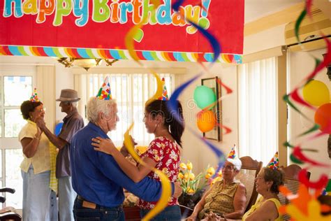 People Enjoy Birthday Party With Friends In Geriatric Hospital Stock