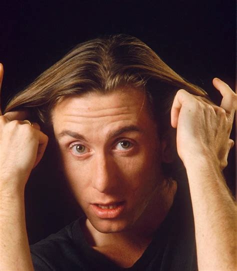 Download Young Tim Roth Playing With His Hair Wallpaper