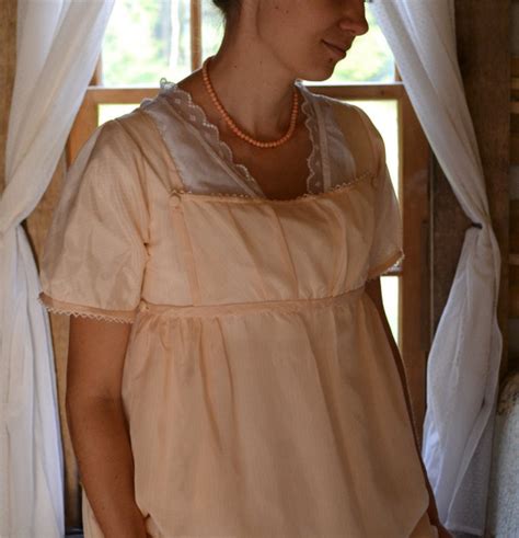 the story of a seamstress peach silk regency apron front dress