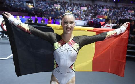 What was nina derwael's score on the uneven bars? Les superbes images de la victoire de Nina Derwael aux ...