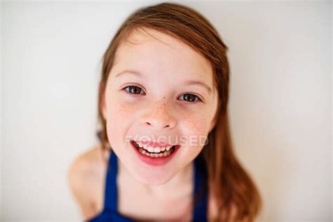 Portrait Of A Smiling Girl With Freckles — People Real People Stock