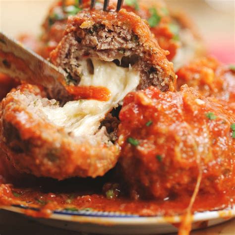 Easy Slow Cooker Mozzarella Stuffed Meatballs And Sauce Recipe By Tasty