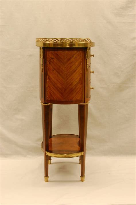 oval shaped sienna marble top french side table with brass gallery and ormolu at 1stdibs