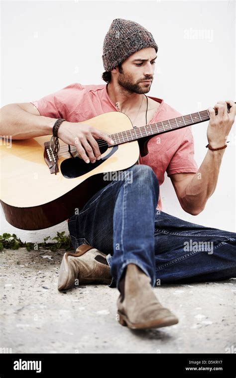 Musician Playing Guitar Outdoors Stock Photo Alamy