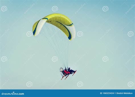 Paraglide Flying Over Clear Blue Winter Sky Stock Photo Image Of