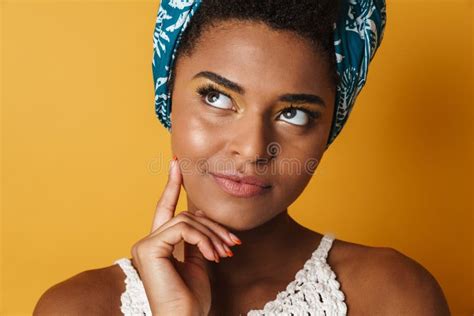 Image Of Serious African American Woman Thinking And Looking Upward