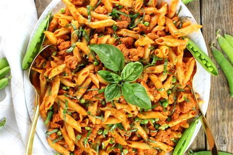 Spicy Chicken Pasta And Peas With Sun Dried Tomato Sauce