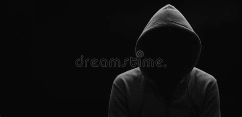 Dark Mysterious Man In A Hoodie Is Hiding His Face Hacker Anonymous Stock Image Image Of