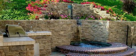 Strip Stone Wall With Waterfall And Radius Brick Steps Garden Projects