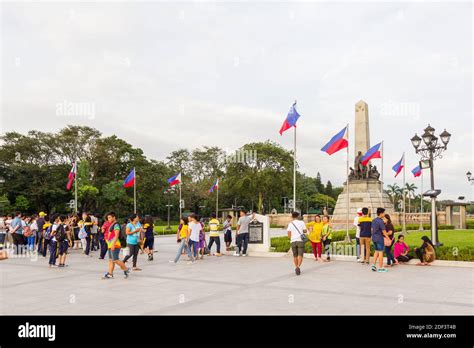 People Visiting The Rizal Park At The Vicinity Of The Jose Rizal
