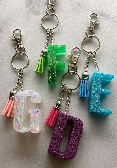 Some Sparkly Resin Keychains Diy Resin Keychain Resin Jewelry Diy