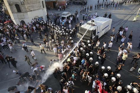 Huru Hara Akhir Zaman Riot Police Use A Water Cannon To Disperse