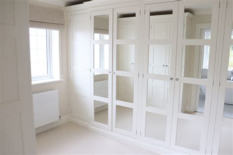 This bedroom wardrobe comes in several colors and has easy style. Painted Bedroom Wardrobes With Mirrors - Bespoke Kitchens ...