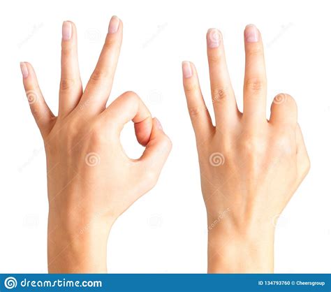 Woman Hands Holding Gesture Of Okay And Showing Three Fingers Stock