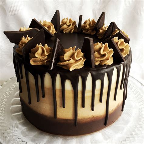 Lemon layer cake with lemon mascarpone filling. Mocha drip cake. Made with dark chocolate cake with coffee buttercream filling. On the outs ...