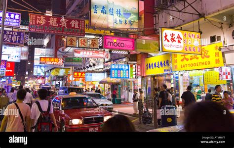 Hong Kong China Colorful Neon Signs And Traffic In Busy Mong Kok