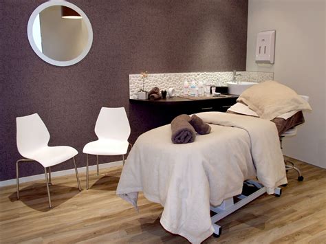 spa room one dark accent wall esthetician room massage therapy rooms esthetics room