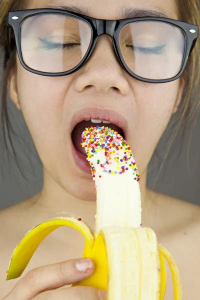 woman eating banana images search images on everypixel