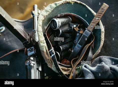 German Military Ammunition Of World War II Helmet Binoculars Submachine Gun Knife Stock