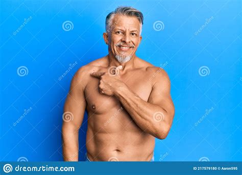 Middle Age Grey Haired Man Standing Shirtless Cheerful With A Smile Of Face Pointing With Hand