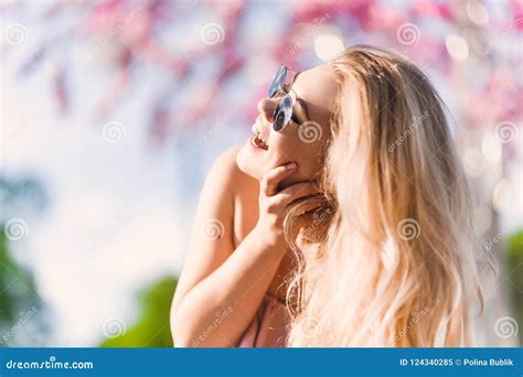 Beautiful Young Blonde Girl In Sunglasses With Puffy Lips And Feminine