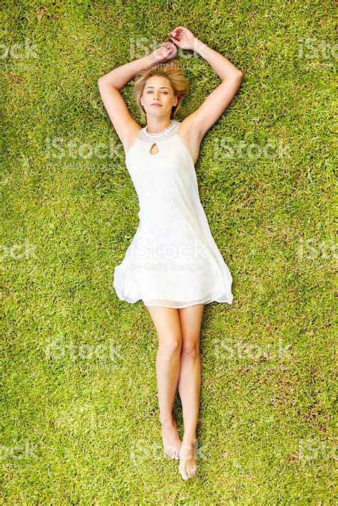 Top View Of A Young Lady Lying On Grass Picture Id152540920 683×1024