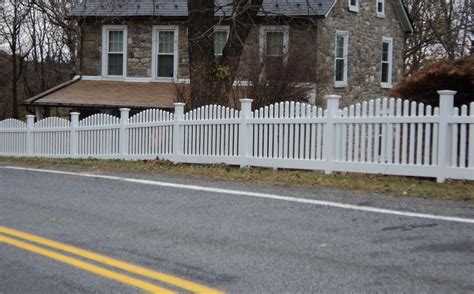 A Beautiful Crown Top Vinyl Picket Fence Surrounds This Old Farmhouse