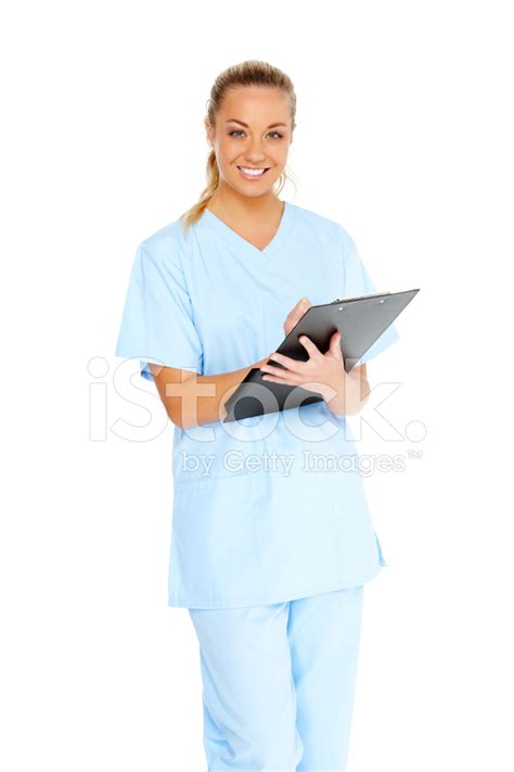 Female Nurse Holding A Clipboard Stock Photo Royalty Free Freeimages