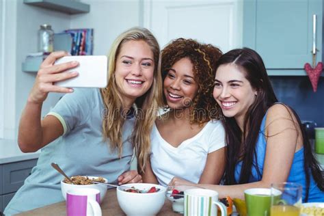 Cheerful Female Friends Taking Selfie Stock Image Image Of Cellphone