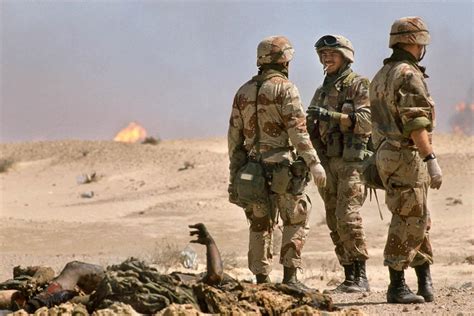 Gulf War 1 Us Soldiers Speak Near An Iraqi Soldiers Corpses In