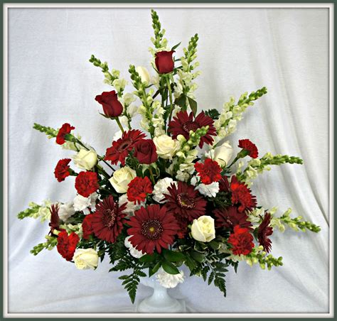 Think blood red roses, white lilies and crimson berries. Beautiful red and white pedestal arrangement | Beautiful ...