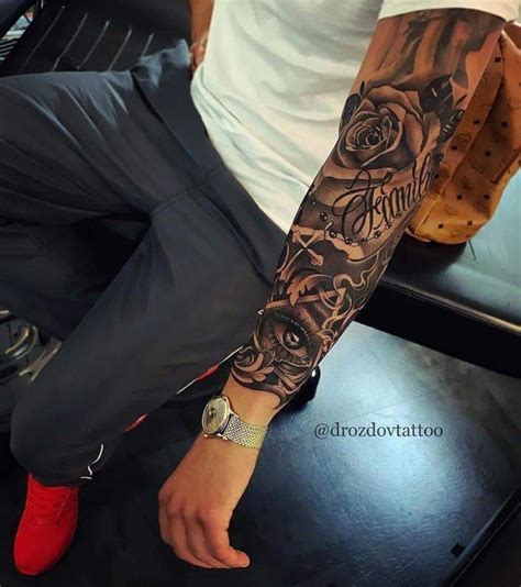 Arm tattoos for men can be anywhere between the shoulder blade till just before the wrist, or it could even be a full sleeve tattoo. Tattoo idea's | Rose tattoo sleeve, Tattoo sleeve men, Tattoos