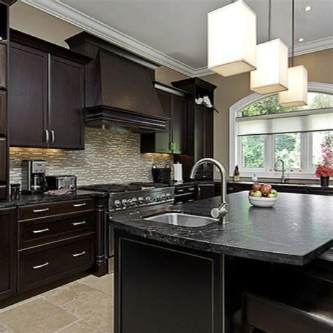 Maybe you would like to learn more about one of these? Dark cabinets with light tile floor | Kitchen & Dining ...