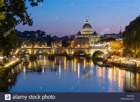 Rome At Night View Over Tiber River On Vatican And Dome Of St Peters
