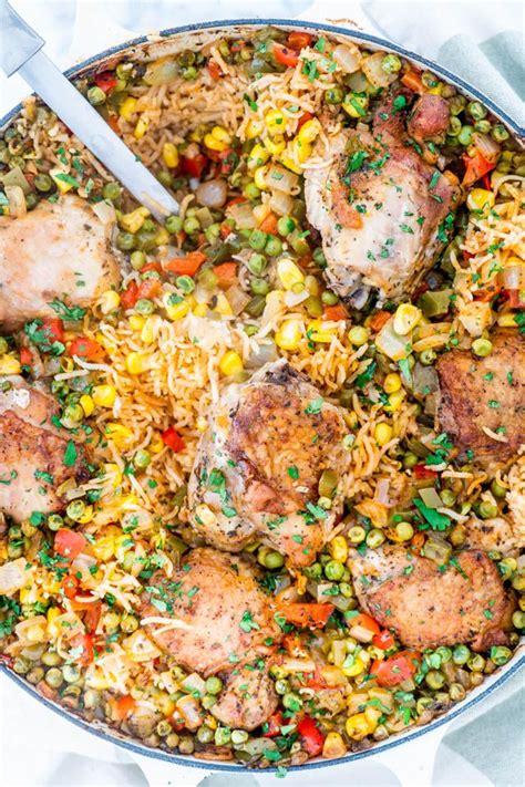 1 55+ easy dinner recipes for busy weeknights. This is the best Arroz Con Pollo recipe! Featuring chicken ...