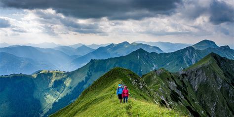 Two Hikers Walking On A Grassy Mountain Ridge Hiking Atop The Grassy Ridge K HD Wallpaper