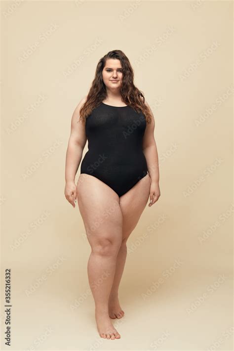 Plus Size Model Big Woman In Black Bodysuit Full Length Portrait Brunette Standing And Looking