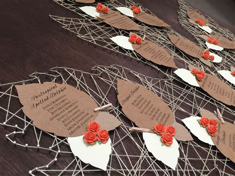 This table takes a more playful approach with the profile using an animal silhouette as a template for the table. Stained Plywood Twine Maple Leaf Autumn Themed Wedding Table Plan | Wedding table themes ...