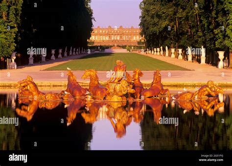 View Of Apollo Fountain And Palace Of Versailles Behind Versailles