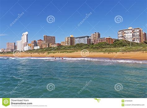 Coastal Landscape Beach Ocean Blue Sky And City Skyline Stock Image
