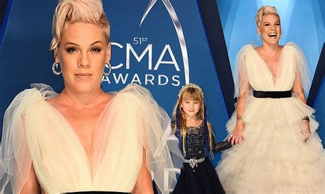 pink wows in dreamy white tulle gown at cmas with daughter daily mail online