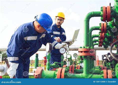Petrochemical Workers Working At Refinery Plant Stock Photo Image Of