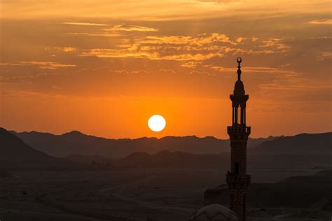 Free Photo Sunset With Muslim Mosque In Foreground