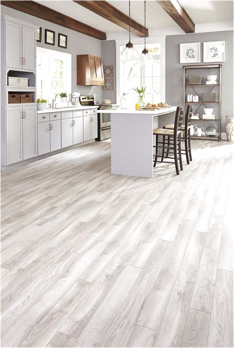 Gray Tones Mixed With Light Creams And Tans Suggest A Floor Worn Over
