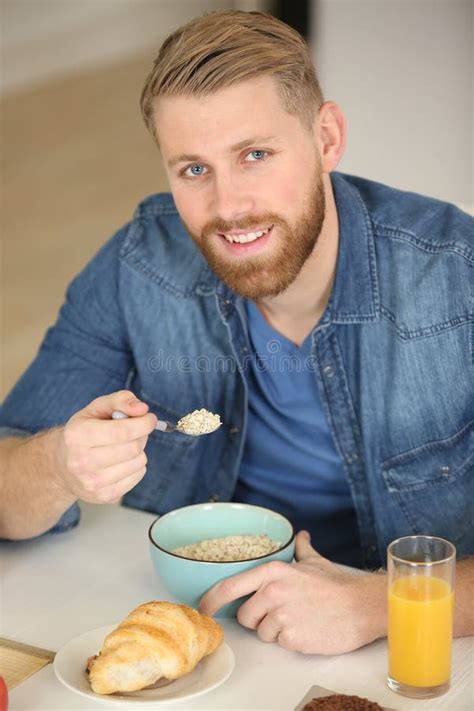 Handsome Man Eating Cereals For Breakfast At Home Stock Image Image Of Life Indoors 250115287