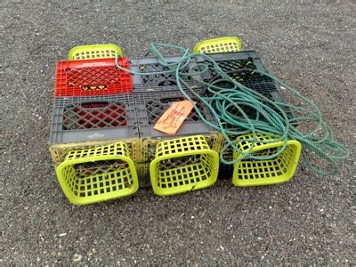 Cut bait holder with monofilament snares around it. DIY Crab Pots | Gearfuse